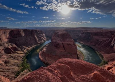 2022-06-16 USA Arizona Page Horseshoe Bend sunset river Colorado river rocks red sky clouds colors red blue green landscape canyon