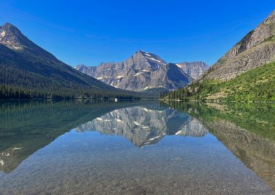 2022-07-27 USA Montana Glacier National Park Grinnell Glacier Hike Nationalpark Wanderung Landschaft Grüne Natur Berge See Josephine Lake Spiegelung