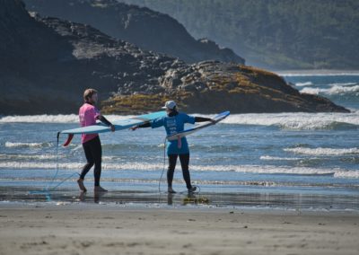 2022-08-08 Canada British Columbia Vancouver Island landscape beach ocean water greens trees forest South Chesterman Beach surf lesson board woman man surfer waves